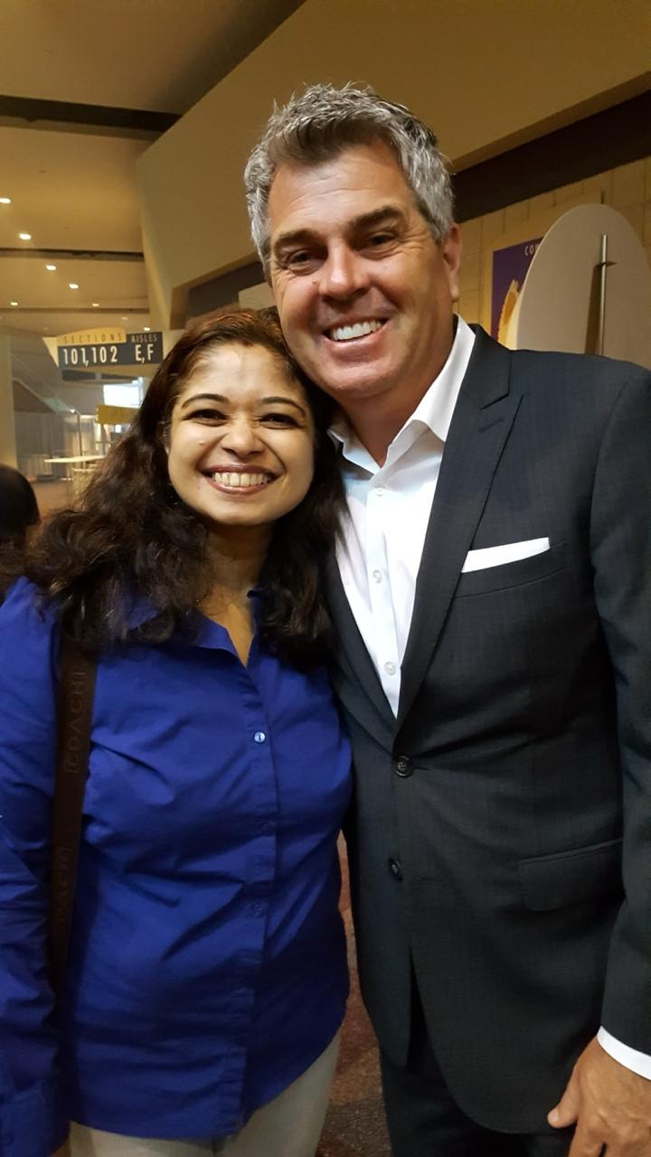 Geetha Krishnan with a fellow leader at a conference